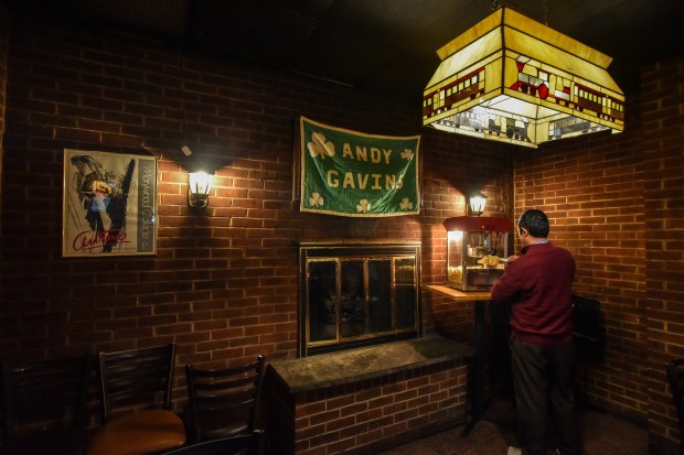 A patron serves himself popcorn in Andy Gavin's in Scranton Friday, April 24, 2026. (SEAN MCKEAG / STAFF PHOTOGRAPHER)