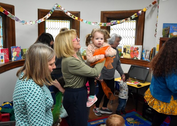 Children participate during the Toddlers on the Move event held to celebrate National Library Week at the Nancy Kay Holmes Branch Library in Scranton Monday, April 20, 2026. (SEAN MCKEAG / STAFF PHOTOGRAPHER)