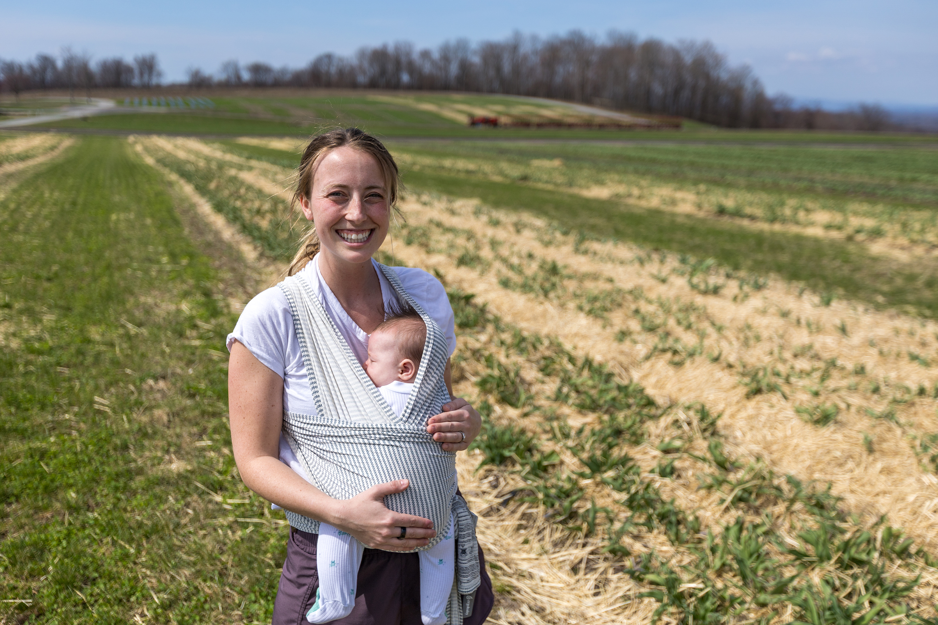 Farm Manager Julianna Roba and her daughter, Annalyn, two months,...