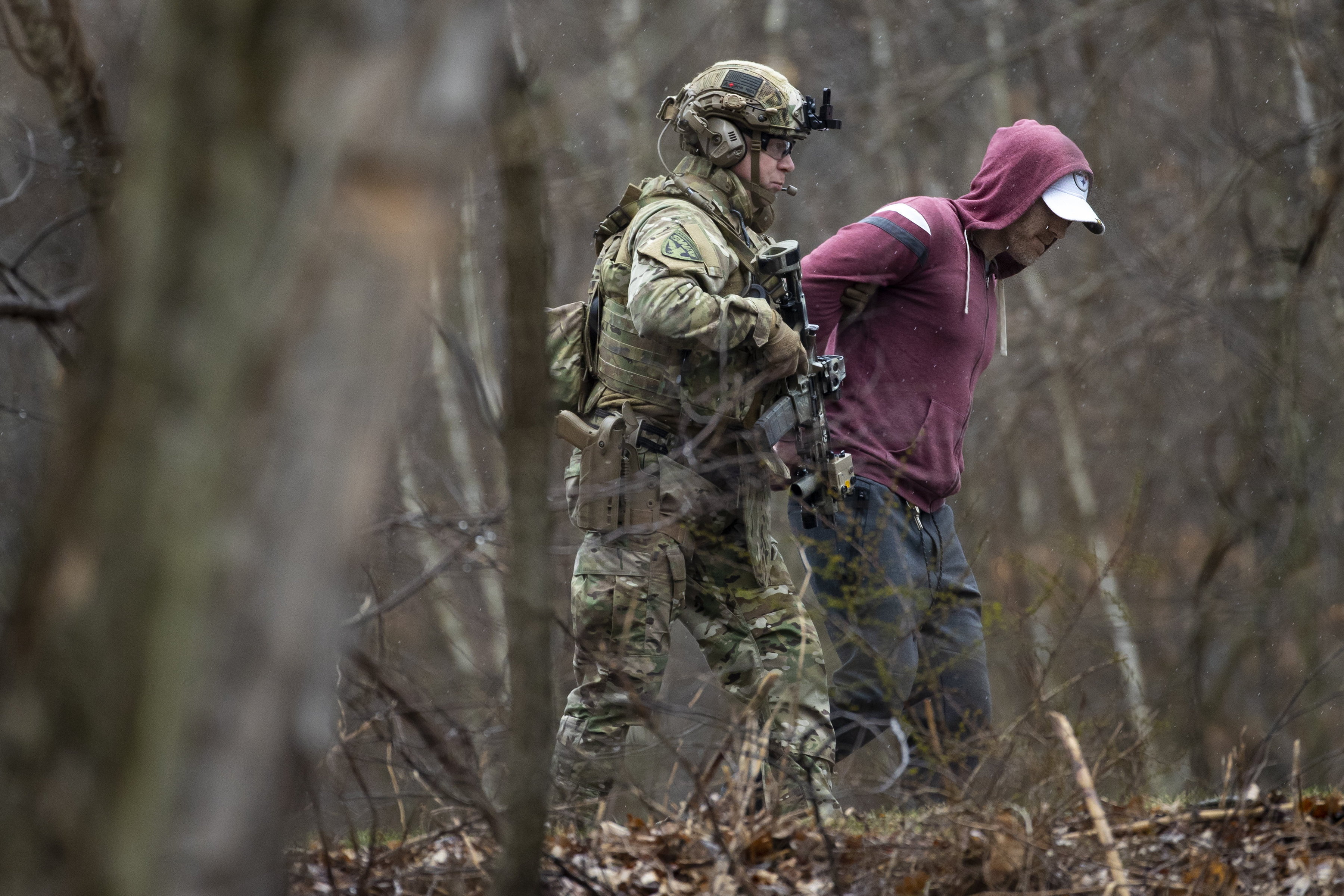 A member of the Lackawanna County SWAT team takes Justin...