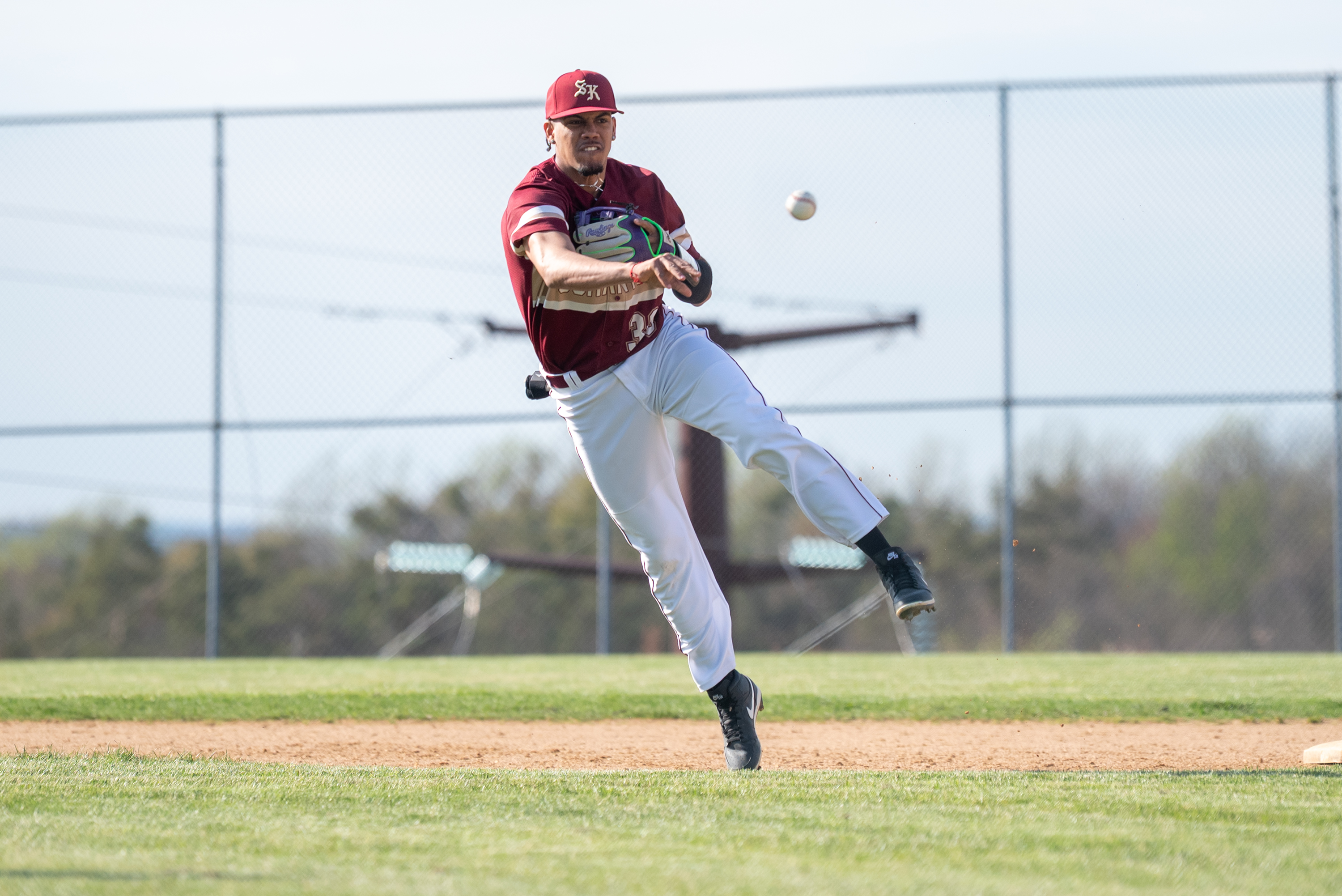 Scranton’s Adrian Hernandez throws the ball to first base during...