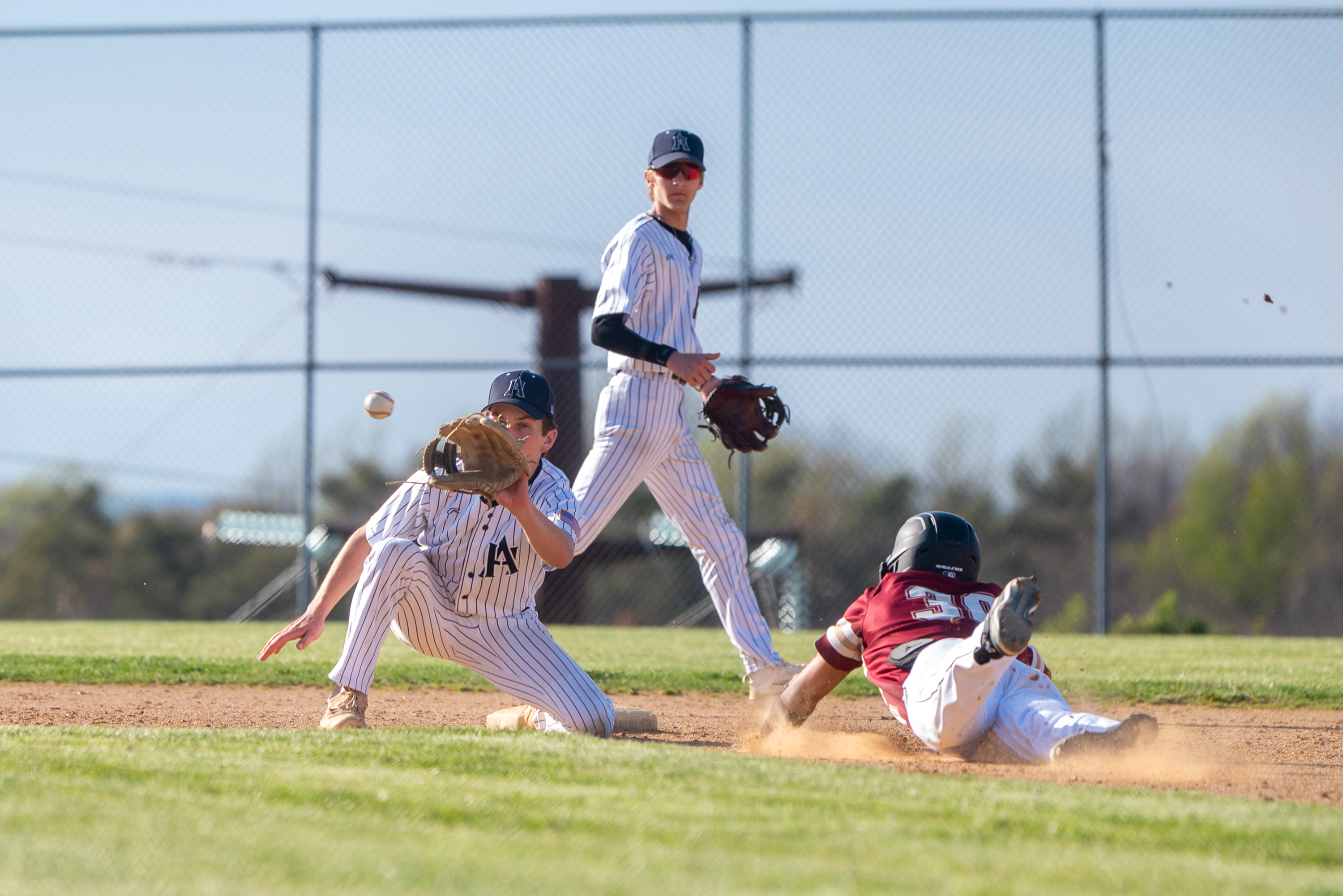 Abington Heights’ Cody Brown gets Scranton’s Adrian Hernandez out a...
