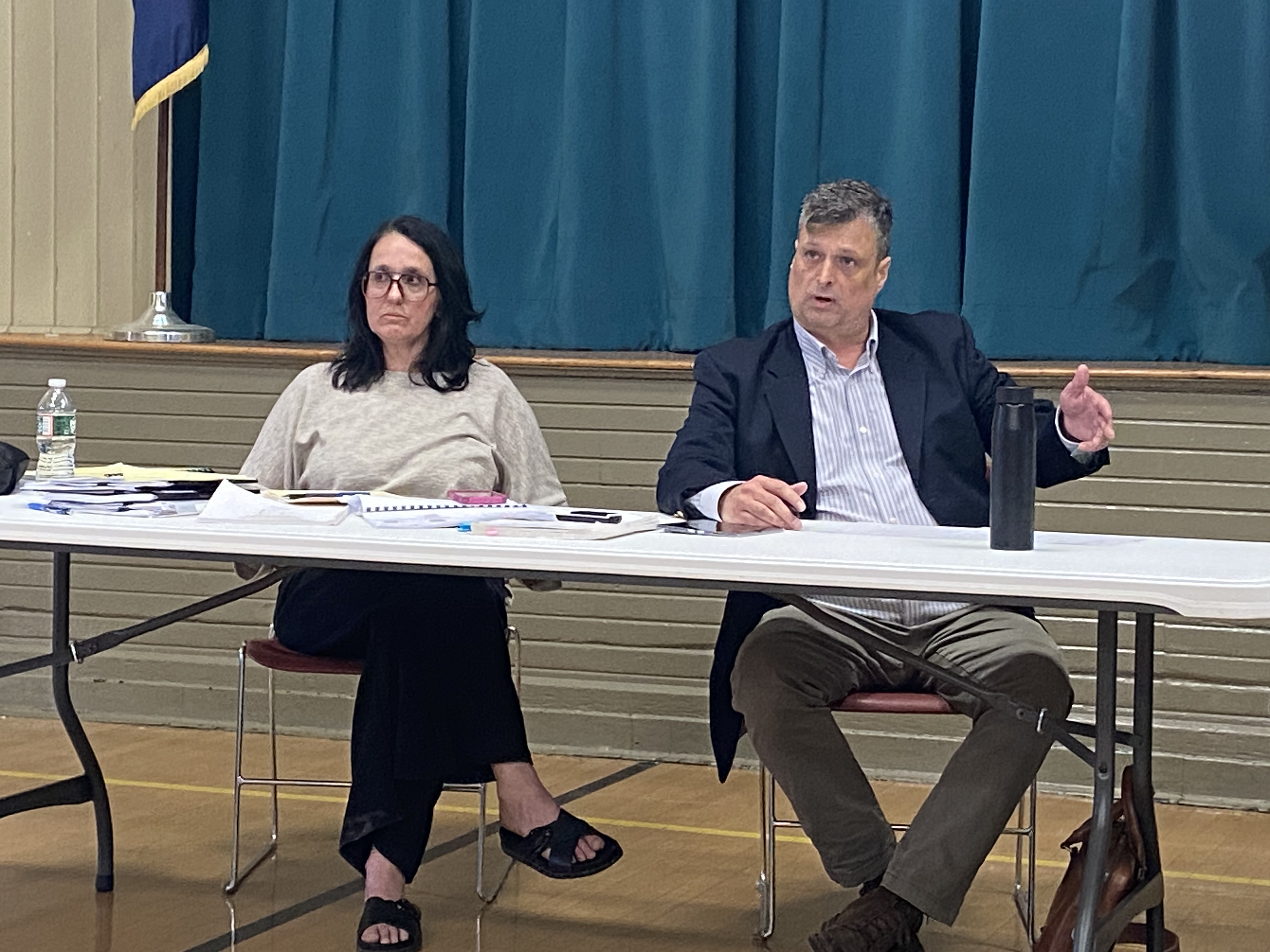 Waverly Twp. Vice Chairman Drew Christian, right, makes a point...