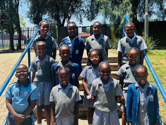 Black children standing in steps