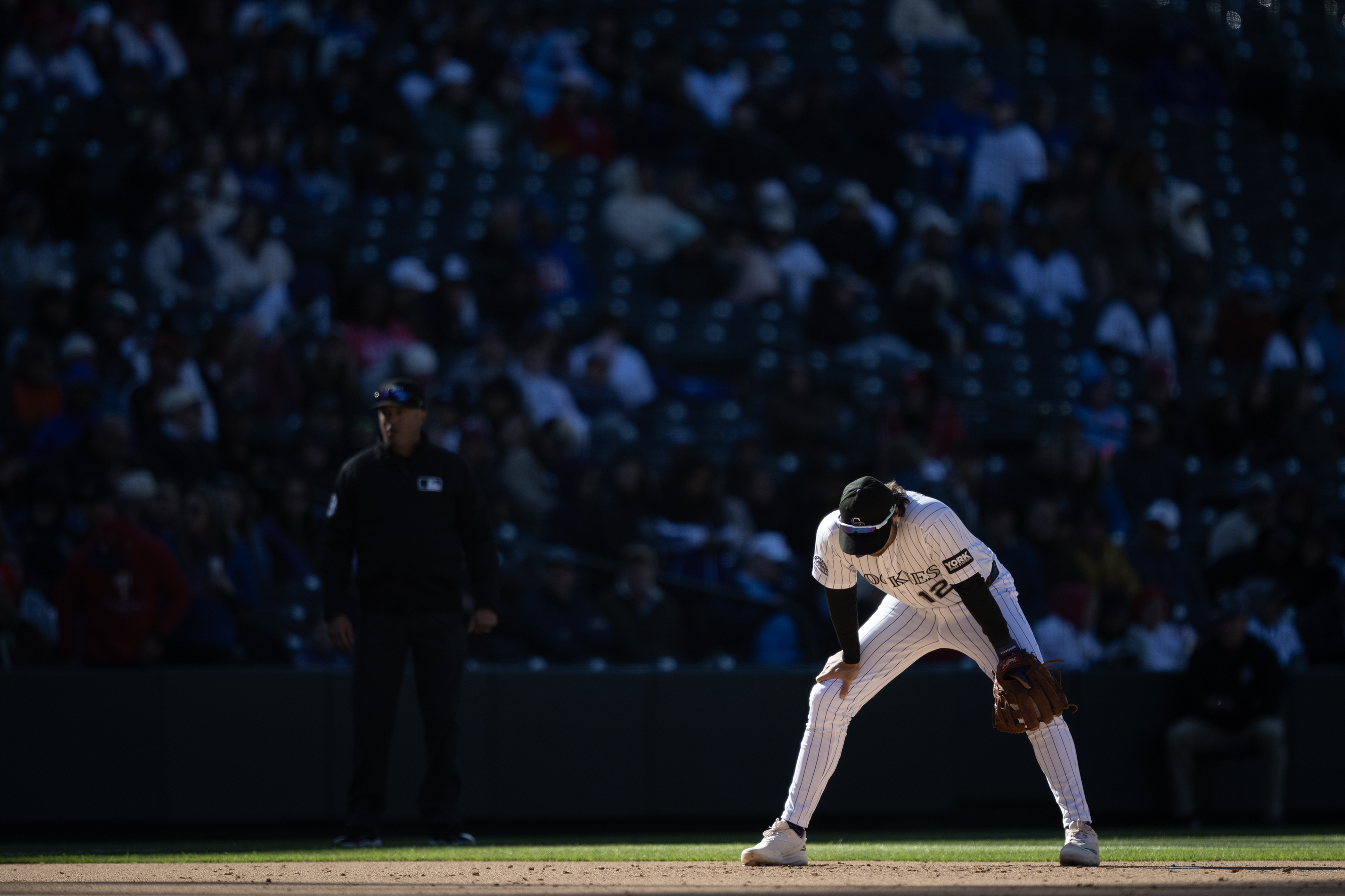 Third baseman Kyle Karros (12) of the Colorado Rockies looks...