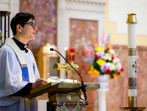 Rev. Giuseppe Esposito speaks Saturday, April 4, 2026, during a blessing of the food baskets on Holy Saturday at St. Anne Catholic Church in Bethlehem. (April Gamiz/The Morning Call)