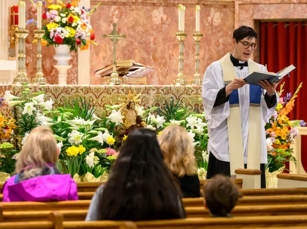 Rev. Giuseppe Esposito speaks Saturday, April 4, 2026, during a blessing of the food baskets on Holy Saturday at St. Anne Catholic Church in Bethlehem. (April Gamiz/The Morning Call)