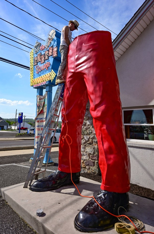 Roadside artist Mark Cline prepares the bottom half of the Giant Chip statue Thursday, April 16, 2026, at Inside Scoop in Coopersburg. The popular, 25-foot-high statue was toppled by high winds in February. Cline, who built the statue, was on site Thursday to repair it. (Monica Cabrera / The Morning Call)