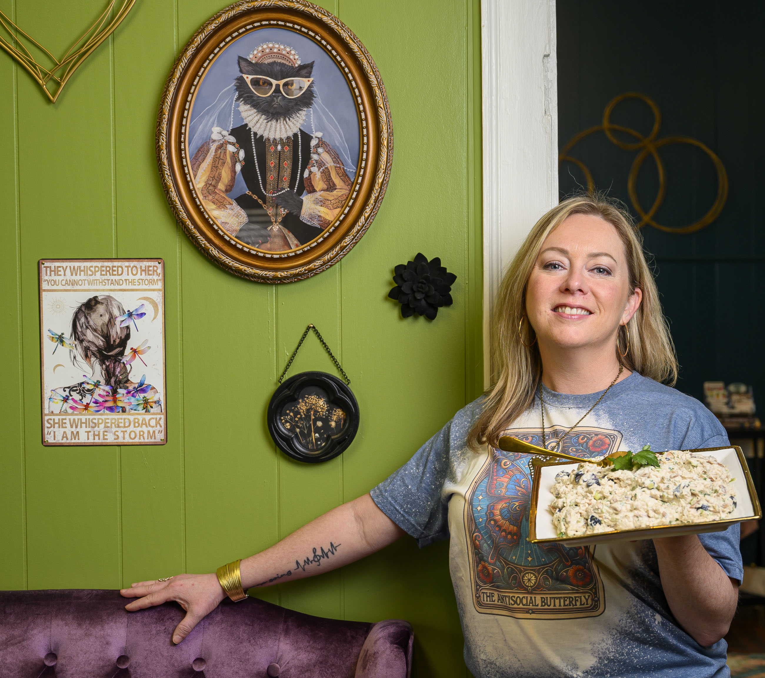 Circle Cafe on Main owner Jennifer O’Neill-Lai holds a dish...