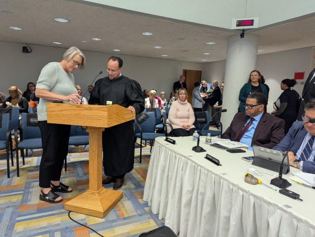 Nancy Wilt, left, is sworn in as an Allentown School Board member Thursday, April 23, 2026. Wilt, who previously served on the board from 2019 to 2023, was selected to fill the vacancy created when board member Ana Tiburcio was elected to the state House. (Elizabeth DeOrnellas / The Morning Call)