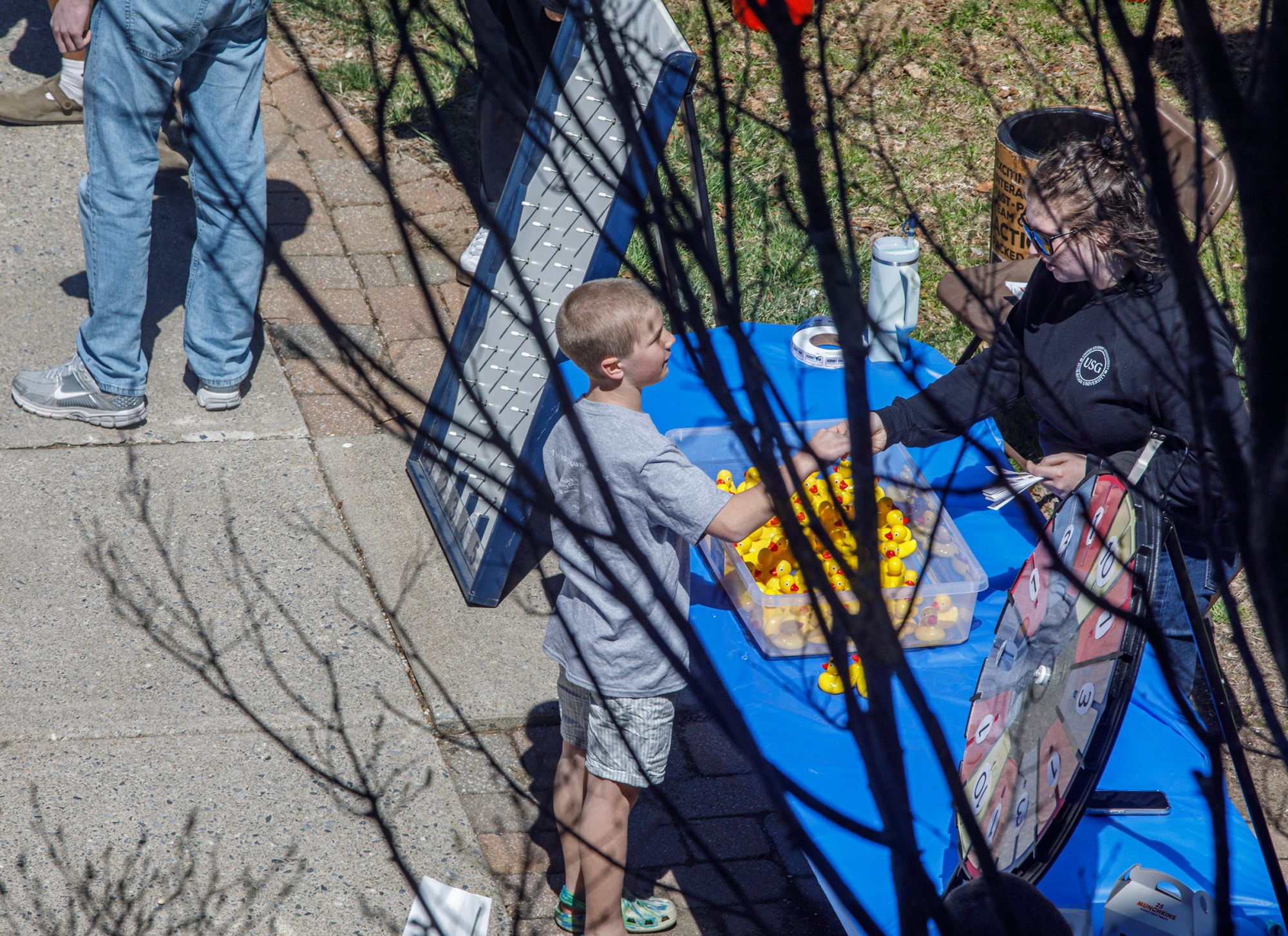 People attend Pawapalooza on Saturday, April 11, 2026, at Moravian University's Priscilla Payne Hurd Academic Complex in Bethlehem. The event supports the Pawprint Project, a student-led organization raising money for the Pediatric Cancer Foundation of the Lehigh Valley. It features live music, games and other activities.(Jane Therese/Special to The Morning Call)