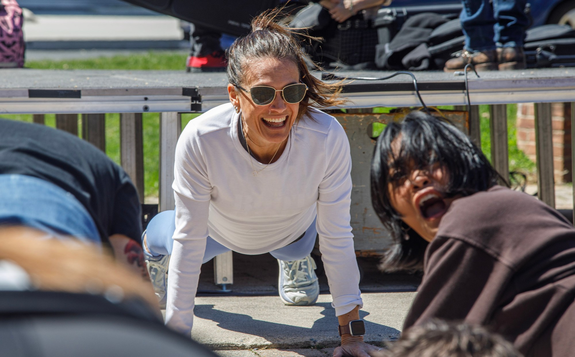 People attend a speed workout led by Rosie Hulbert of Macungie during Pawapalooza on Saturday, April 11, 2026, at Moravian University's Priscilla Payne Hurd Academic Complex in Bethlehem. The event supports the Pawprint Project, a student-led organization raising money for the Pediatric Cancer Foundation of the Lehigh Valley. It features live music, games and other activities.(Jane Therese/Special to The Morning Call)