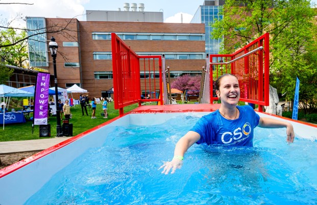 Lehigh University student Alana Reddy jumps into the cold water Friday, April 17, 2026, during Special Olympics Pennsylvania's Mobile Polar Plunge at Lehigh University in Bethlehem. More than 100 Lehigh students and staff jumped into the water to raise money and awareness for athletes with intellectual and developmental disabilities. (April Gamiz/The Morning Call)