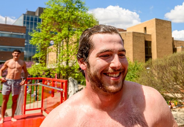 Lehigh University student Jake Stalsitz jumps into cold water Friday, April 17, 2026, during Special Olympics Pennsylvania's Mobile Polar Plunge at Lehigh University in Bethlehem. More than 100 Lehigh students and staff jumped into the water to raise money and awareness for athletes with intellectual and developmental disabilities. (April Gamiz/The Morning Call)