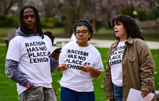 Justin Burrell, president of Lehigh University's Black Student Union, and Lehigh students Kaitlan Prioleau and Mia Miranda speak Monday, April 6, 2026, at the university in Bethlehem. Students say racist messages were drawn on two plastic jugs, known as BORGs, found on or near the campus in recent months, and they were calling on leadership to address it. (Monica Cabrera/The Morning Call)