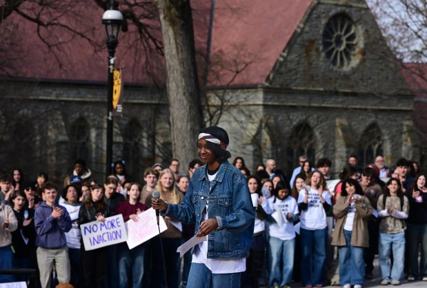 Lehigh University student Amayah Wade recites the Maya Angelou poem "Still I Rise" during a public demonstration against racism Monday, April 6, 2026, at the university in Bethlehem. Students say racist messages were drawn on two plastic jugs, known as BORGs, found on or near the campus in recent months, and they were calling on leadership to address it. (Monica Cabrera/The Morning Call)