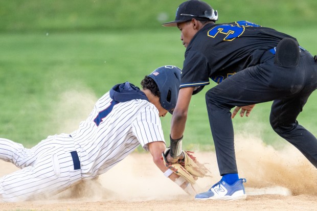 Allen's Jose Mora (34) tries to tag out Liberty's Dereon Ellis (1) , on April 17, 2026, in Bethlehem. (Jonathan Broady/Special to The Morning Call)