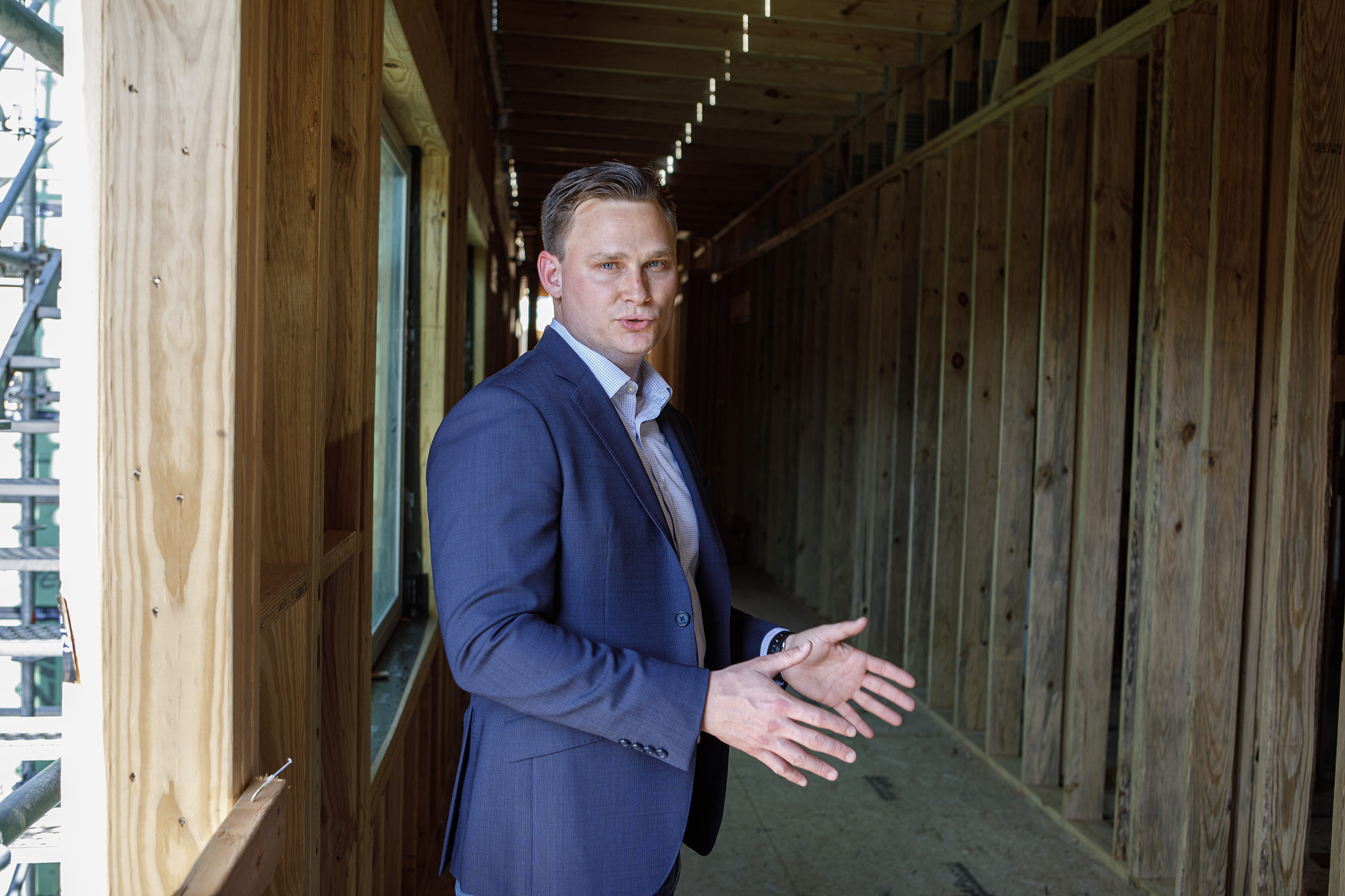 Jonathan Strauss of Cortex Residential speaks during a tour of...