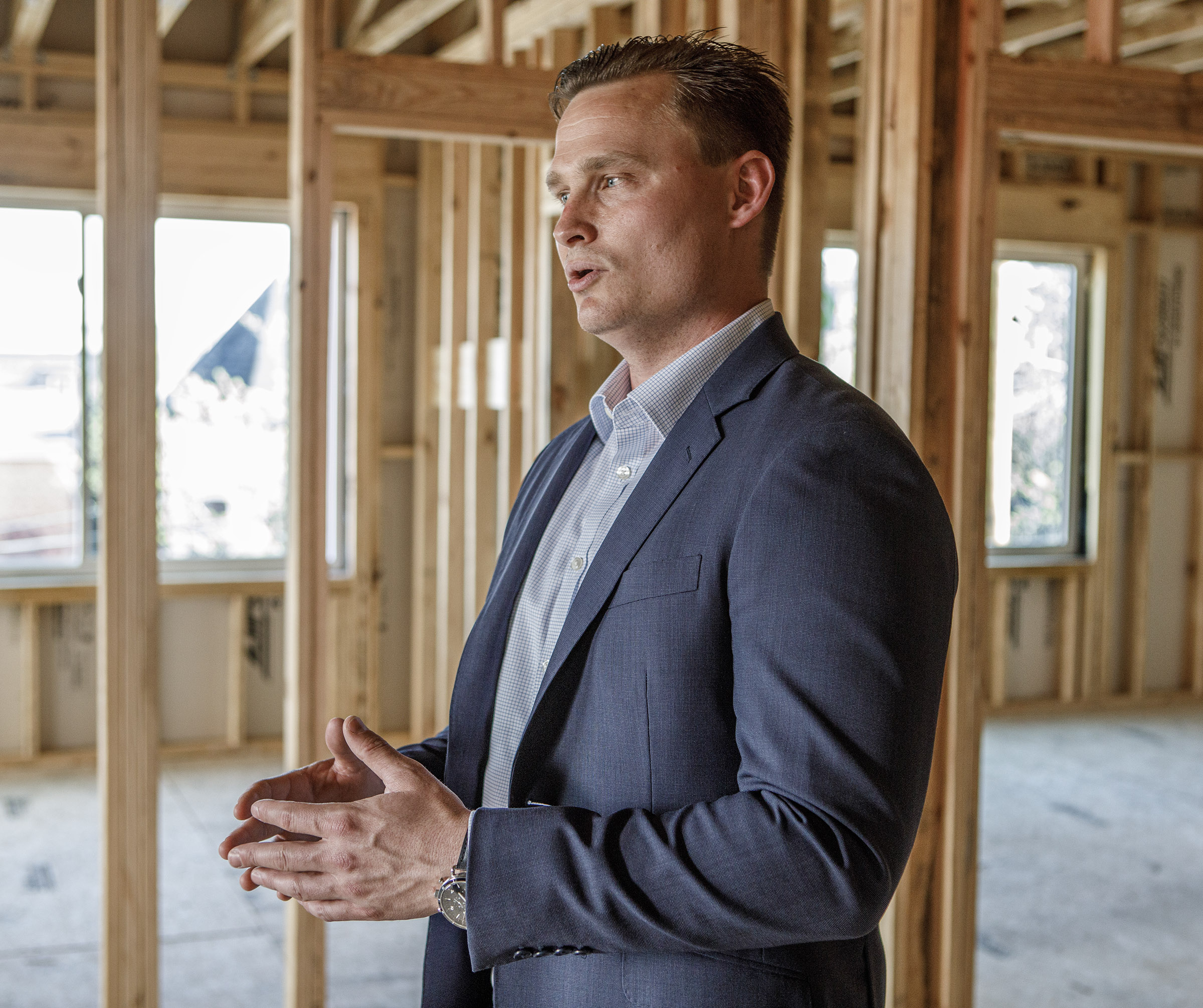 Jonathan Strauss of Cortex Residential speaks during a tour at...