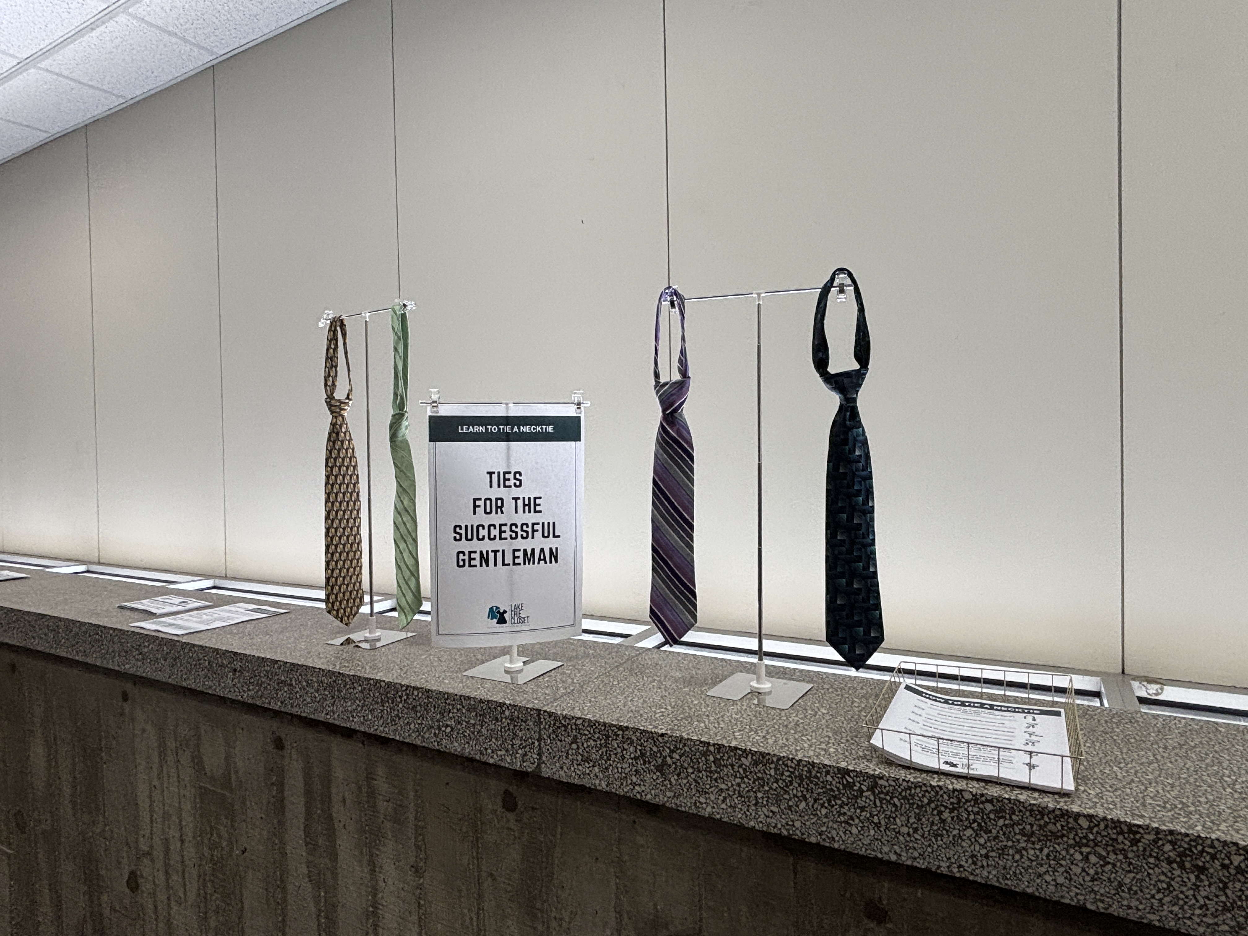 Ties are displayed outside the Lake Erie Closet after its...