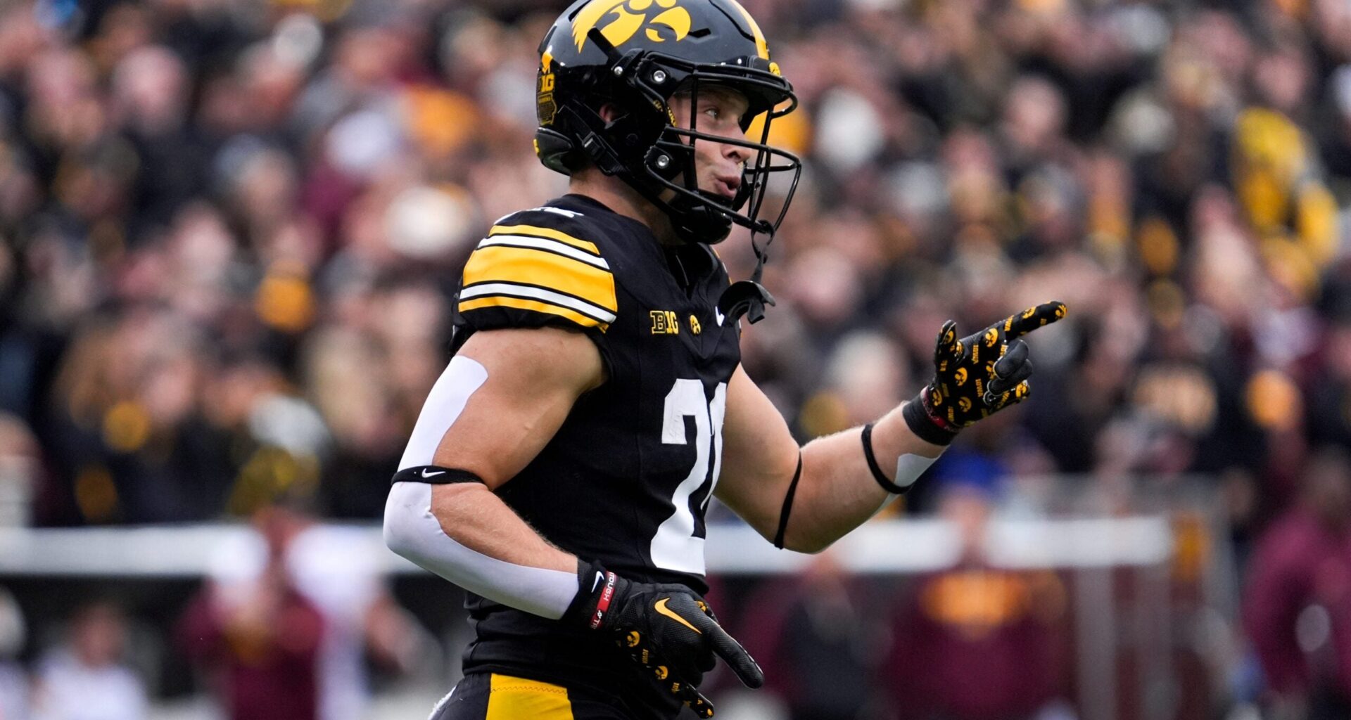 Iowa Hawkeyes wide receiver Kaden Wetjen (21) reacts after returning a punt for a touchdown against the Minnesota Golden Gophers Oct. 25, 2025 at Kinnick Stadium in Iowa City, Iowa.