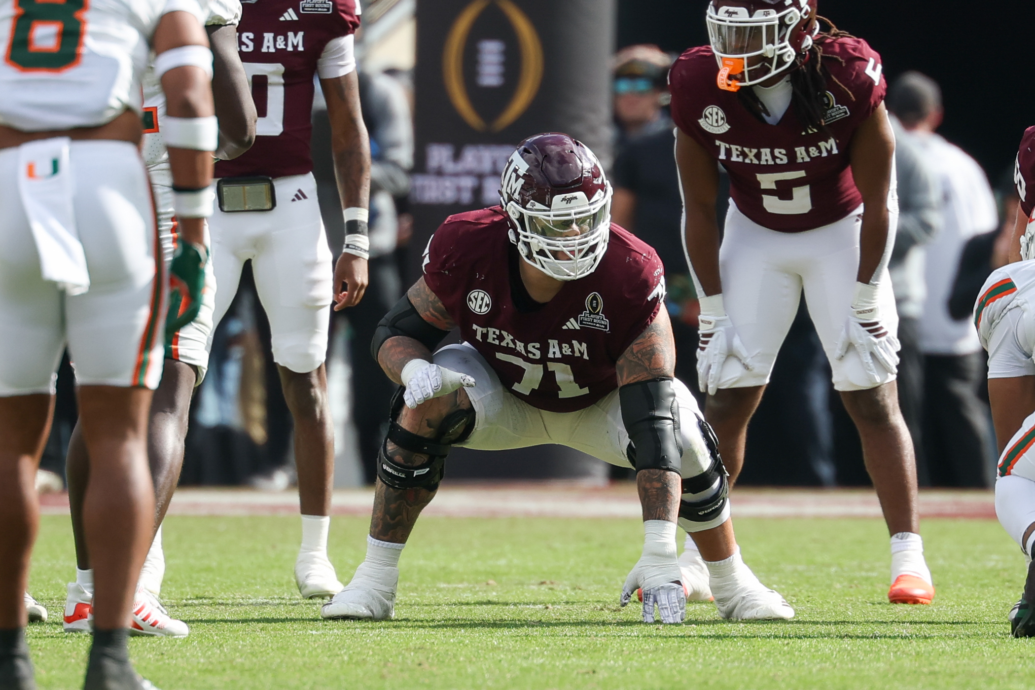 COLLEGE STATION, TX - DECEMBER 20: Offensive lineman Chase Bisontis #71 of the Texas A&M Aggies readies for play during the CFP First Round game between Miami Hurricanes and Texas A&M Aggies on December 20, 2025, at Kyle Field in College Station, TX. (Photo by David Buono/Icon Sportswire via Getty Images)