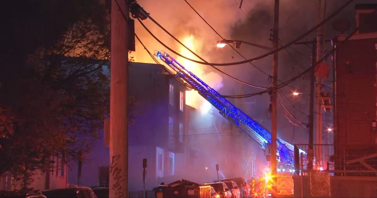 Massive fire spreads to 2 Pittsburgh homes; Mother, son and 2 firefighters injured