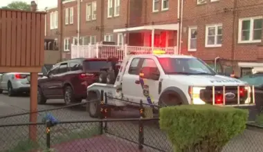 Police say man found in burning car had been shot to death