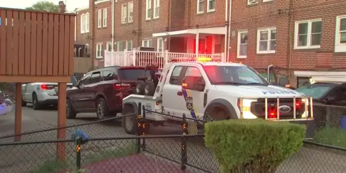 Police say man found in burning car had been shot to death