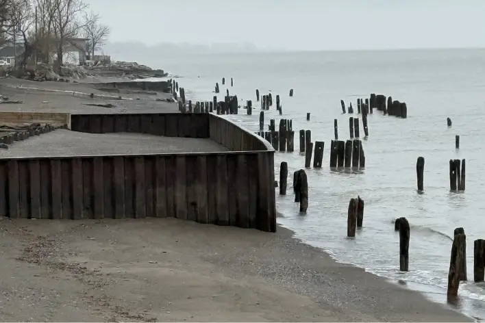A mix of older and newer shoreline protection structures along the Lake Erie shoreline near Erie Shore Drive. (Kylie Brezden)