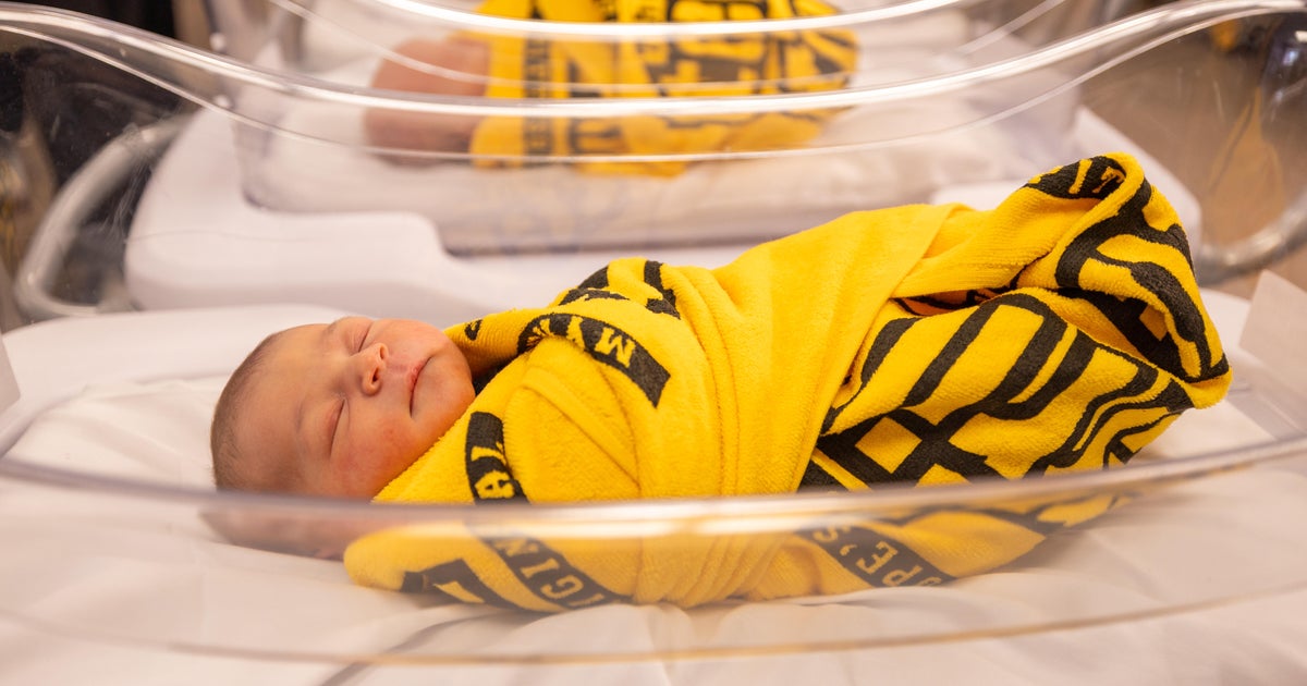 Photos show newborn babies swaddled in Terrible Towels to celebrate NFL draft