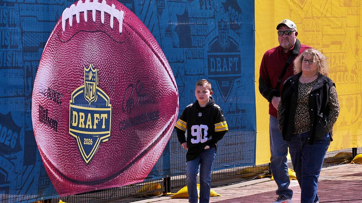 Fans visiting the area around the 2026 NFL Draft stage outside Acrisure Stadium in Pittsburgh