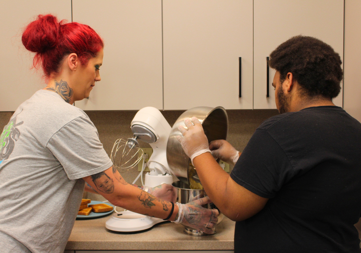 A teacher works with a student at Barber National Institute