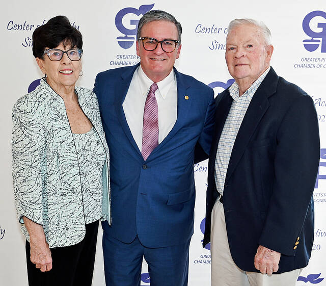 <p>Pennsylvania Secretary of Transportation Michael Carroll, center, poses with his parents, Jean and Mike Carroll.</p>
<p>Tony Callaio | For Sunday Dispatch</p>
