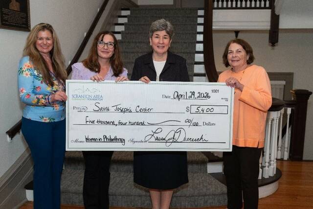 <p>Laura Ducceschi, president and CEO of Scranton Area Community Foundation; Tamara Hall of St. Joseph’s Center; Sister Maryalice Jacquinot, president and CEO of St. Joseph’s Center; and Ann Powell, WIP supporter, hold the check to St. Joseph’s Center.</p>
<p>Submitted photo</p>