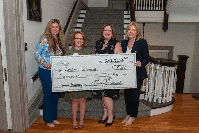 <p>Laura Ducceschi, president and CEO of Scranton Area Community Foundation; Sue Cosgrove, assistant director of school programs for Lacawac; and Patti Thomas, Scranton Area Community Foundation Board Governor and WIP supporter, hold the check to Lacawac Sanctuary Environmental Education Center.</p>
<p>Submitted photo</p>