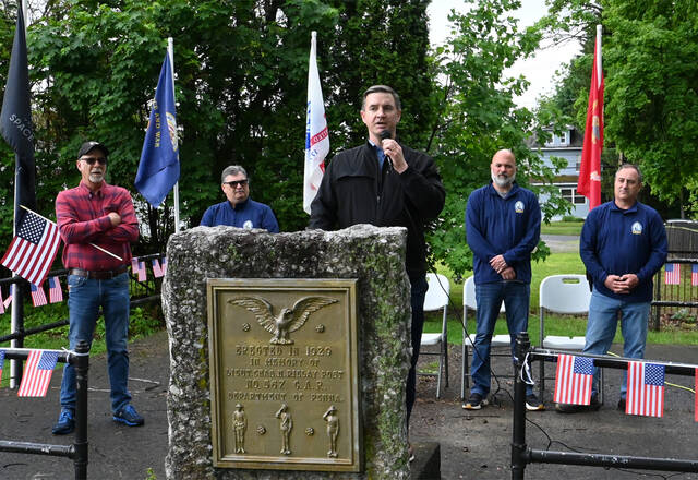 <p>West Pittston District Magistrate Matthew Carmody (at podium) addressed those in attendance for the Memorial Day program at the conclusion of the annual parade.</p>
<p>Tony Callaio | For Sunday Dispatch</p>
