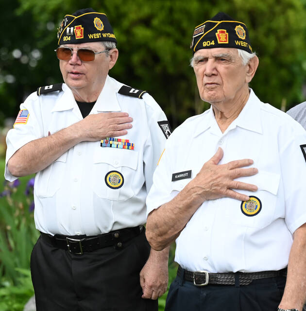 <p>Veterans Jerry Domkowski, left, and Len Karrott are shown reciting the Pledge of Allegiance at the beginning of the Memorial Day Parade ceremony at the Wyoming Cemetery.</p>
<p>Tony Callaio | For Sunday Dispatch</p>