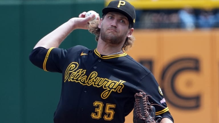 Pittsburgh Pirates pitcher Braxton Ashcraft delivers against the Cincinnati Reds...