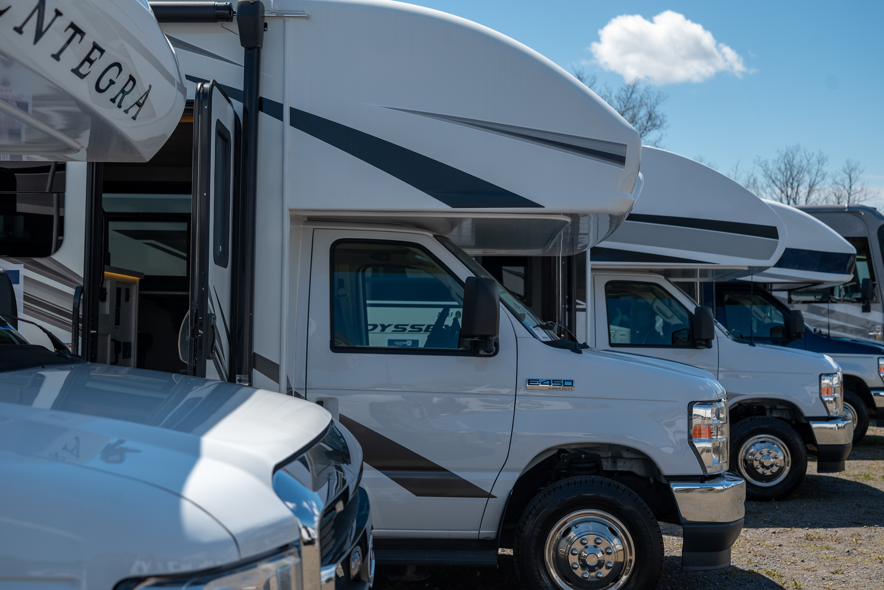 RVs lined up in a parking lot at PNC Field...