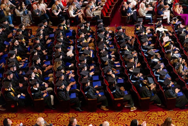 Johnson College's Class of 2026 graduates applaud during the closing remarks of their commencement ceremony on May 7, at the F.M. Kirby Center for the Performing Arts in Wilkes-Barre.