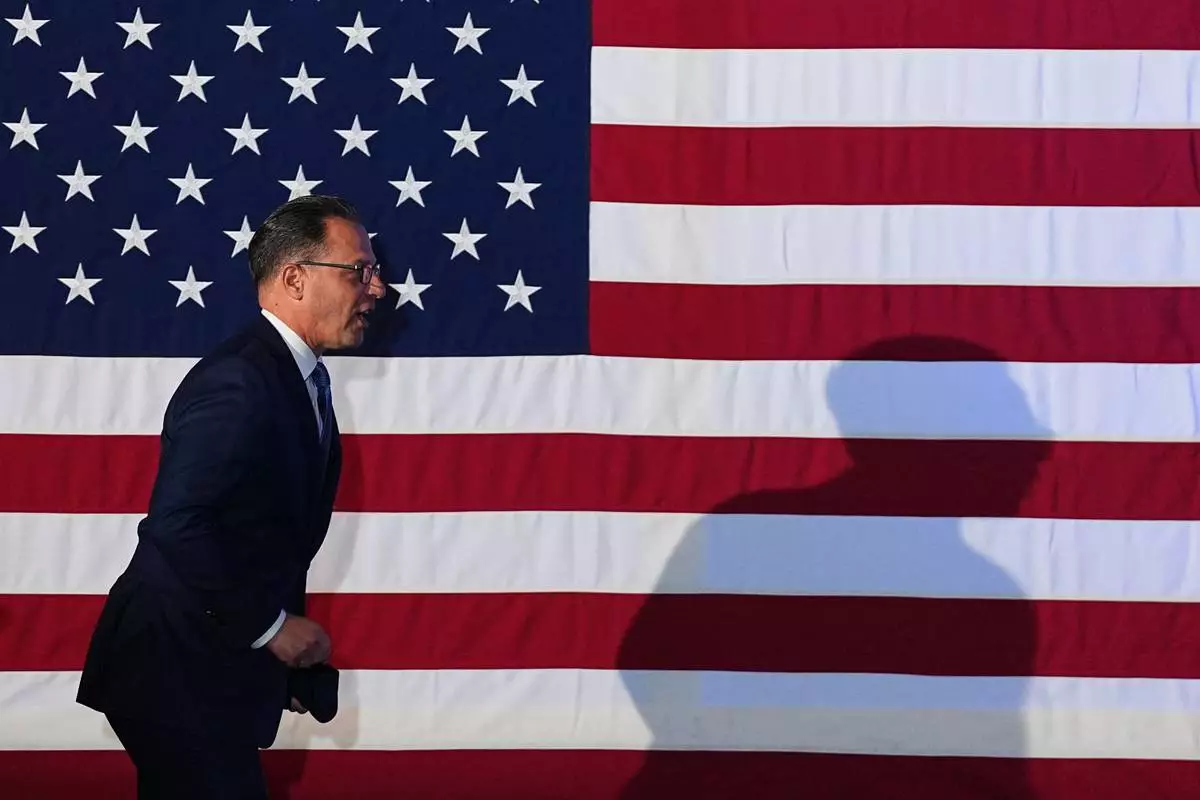 Pennsylvania Gov. Josh Shapiro arrives to speak at an election night watch party in Warminster, Pa., Tuesday, May 19, 2026. (AP Photo/Matt Rourke)