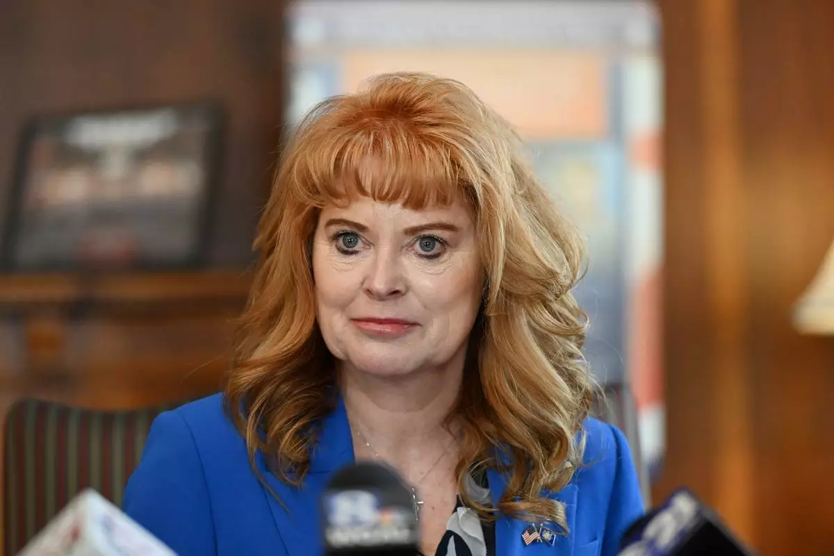 FILE - Pennsylvania state Treasurer Stacy Garrity listens to a question during a news conference in Treasury Department offices, April 23, 2026, in Harrisburg, Pa. (AP Photo/Marc Levy, File)