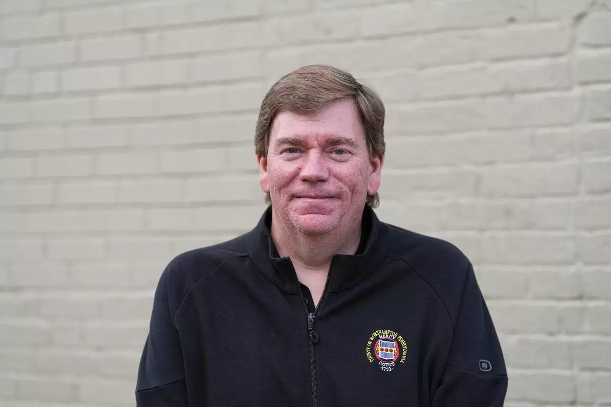 FILE - Lamont McClure, a candidate for the Democratic nomination in Pennsylvania's 7th Congressional District, poses for a photograph in Bethlehem, Pa., May 11, 2026. (AP Photo/Matt Rourke, File)