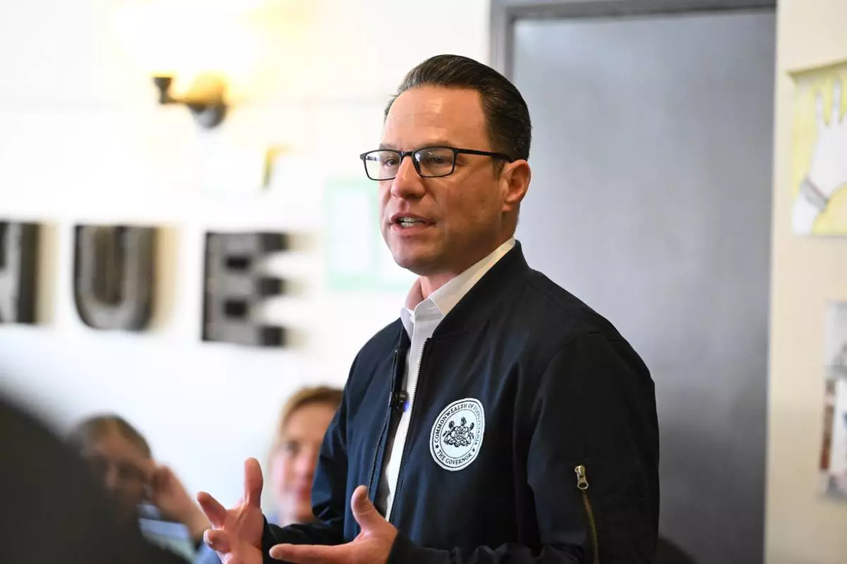 FILE - Pennsylvania Gov. Josh Shapiro speaks to the crowd at a Clinton County Democratic Party event at the Avenue 209 coffee shop, April 11, 2026, in Lock Haven, Pa. (AP Photo/Marc Levy, File)
