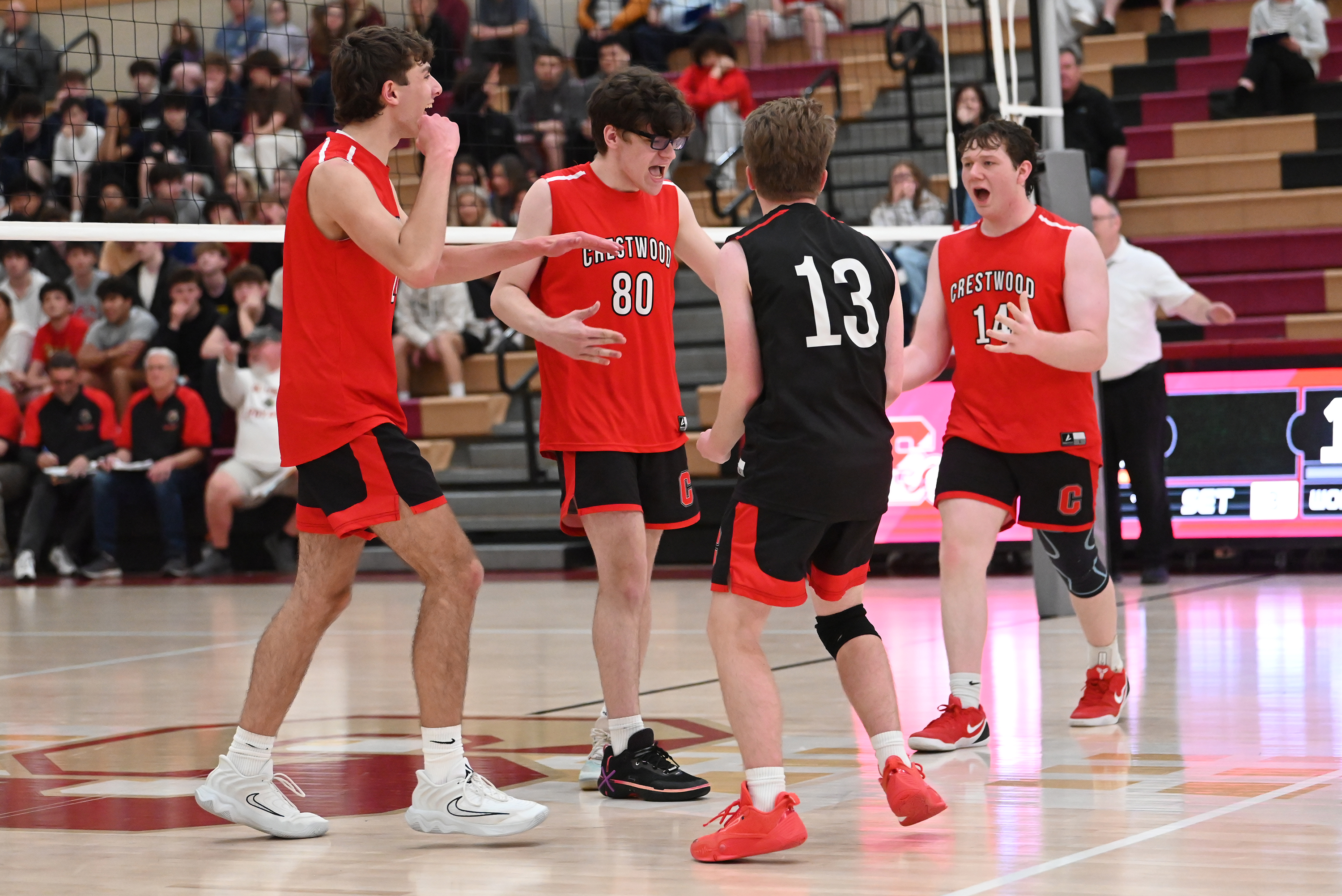 Crestwood’s boys volleyball team celebrates during the 2A championship game...