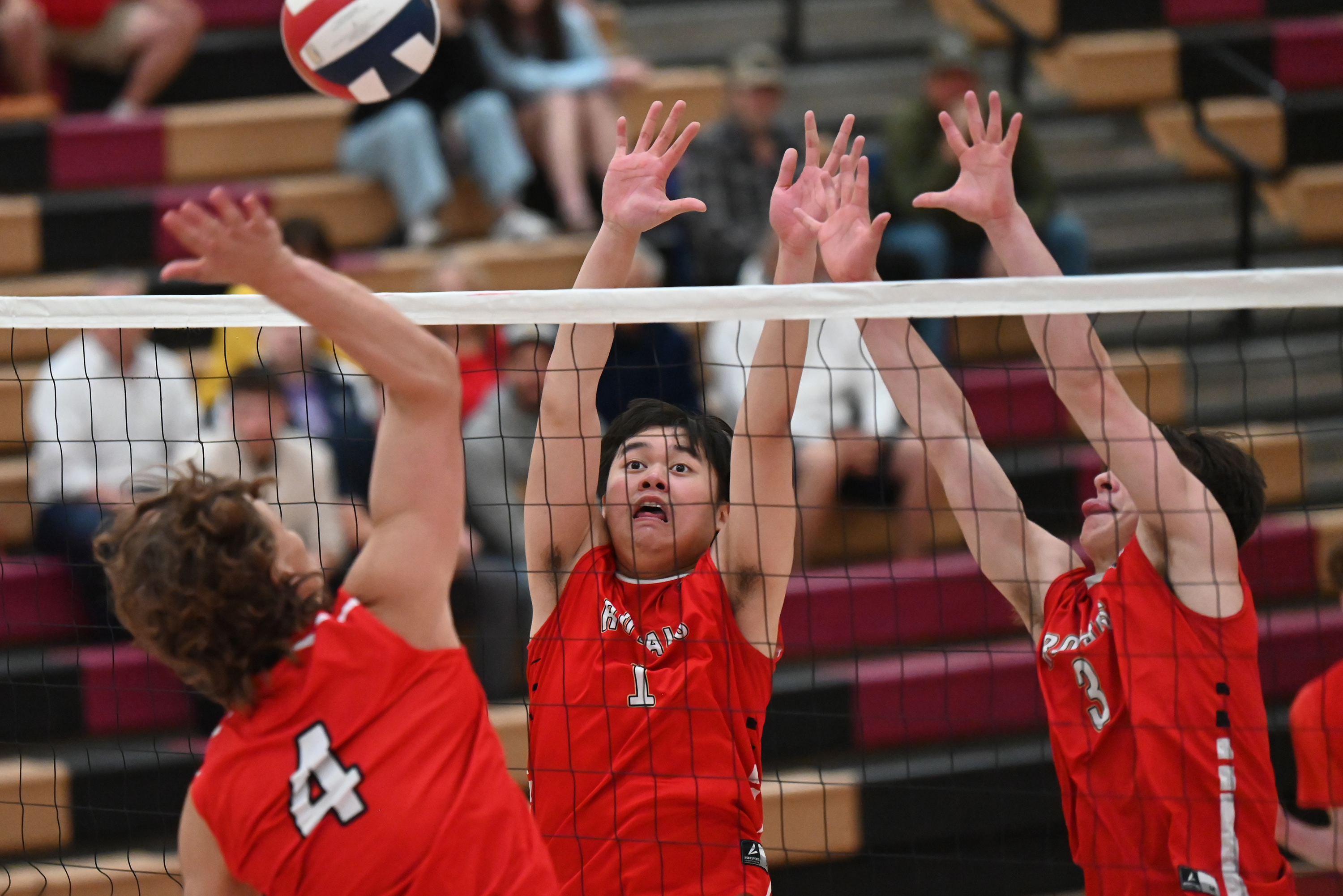 Holy Redeemer’s Koirey Tang and Max Mohutsky attempt to block...