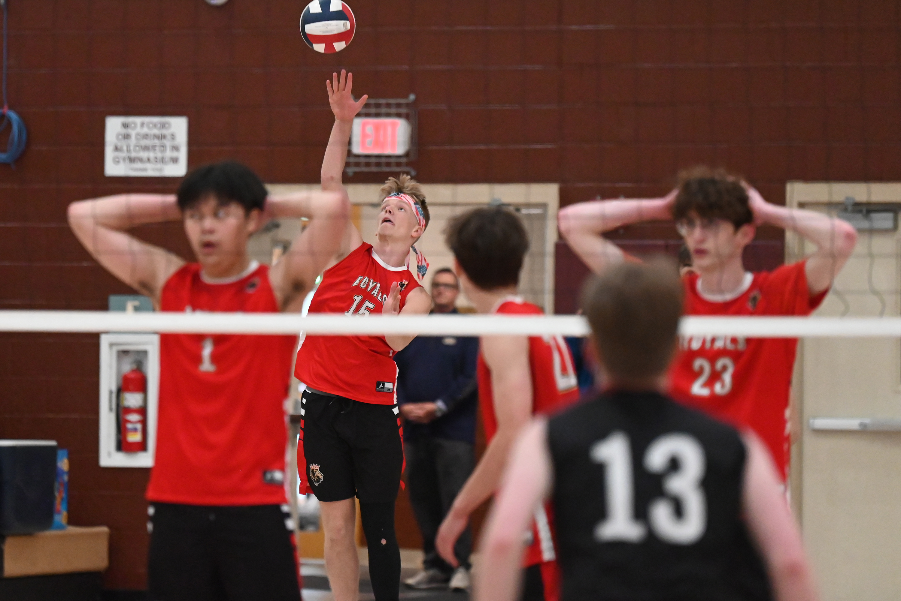 Holy Redeemer’s Jack Wasiakowski serves during the 2A championship game...