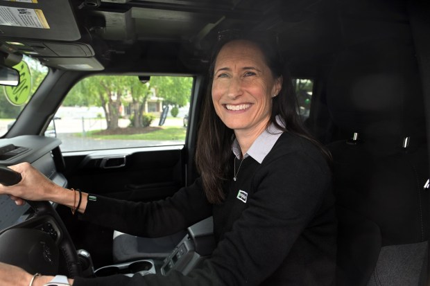 Brenda Rosado, group car sales manager, sits behind the wheel of a 2025 Ford Bronco as Enterprise Mobility opened a location for both car rentals and sales at 3930 Pottsville Pike, Muhlenberg Township, on Friday, May 15, 2026. (BILL UHRICH/MEDIANEWS GROUP)