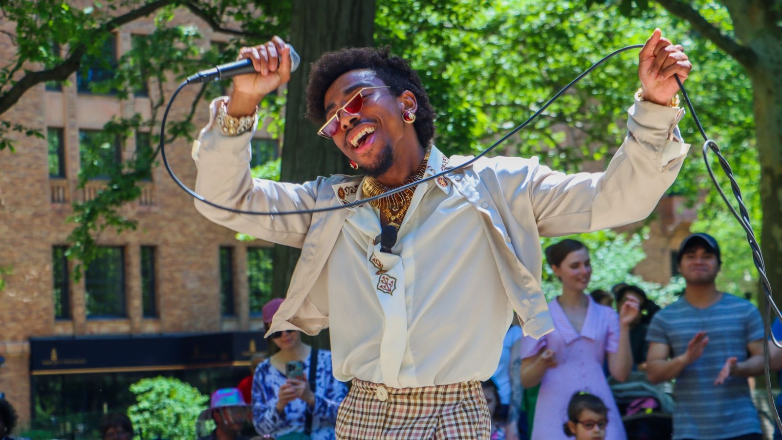 Rising music artist sings original songs in the streets of Philadelphia